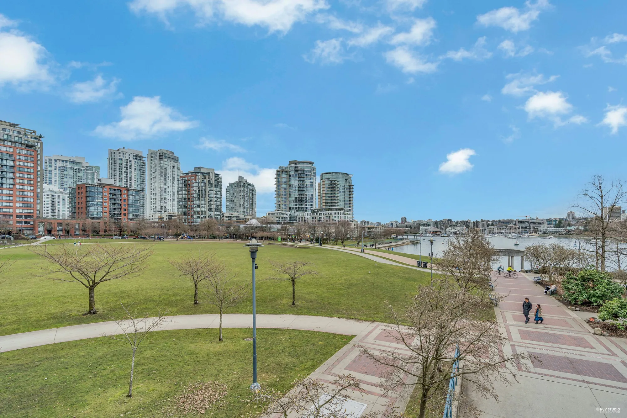 David Lam Park from a window in the tower: lawns, paths, the seawall and False Creek, the towers of the far shore